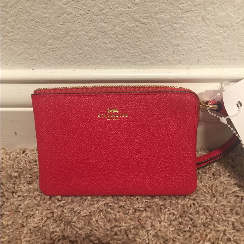 BNWT bright pink Coach wristlet